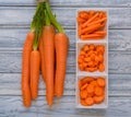 Bunch of fresh sweet carrot on light wooden background Royalty Free Stock Photo