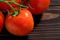 Bunch of fresh tomatoes with water drops