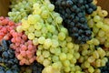 Bunch of fresh white table grapes with the black and red Royalty Free Stock Photo