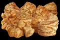 Bunch of Freshly Baked Sesame Cheese Puff Pastry Isolated on Black Background