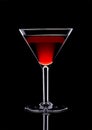 Grape red wine in a glass on a black background Royalty Free Stock Photo