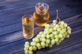 Bunch of grapes and a pitcher grape juice