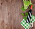 Bunch of grapes, red wine bottle Royalty Free Stock Photo