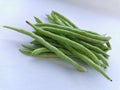 Bunch of green beans isolated on white background. Focus sharp selective point. Royalty Free Stock Photo