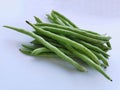 Bunch of green beans on white background. Selective focus. Royalty Free Stock Photo