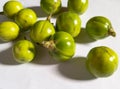 Bunch of green fresh african eggplant with white background