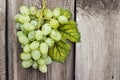 Bunch of green grapes on wooden background Royalty Free Stock Photo