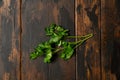 Bunch of green parsley on wooden rustic table. Top view. Royalty Free Stock Photo