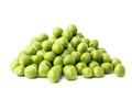 A bunch of green peas on a white, close-up. Royalty Free Stock Photo