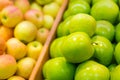 Bunch of green and yellow apples in supermarket Royalty Free Stock Photo