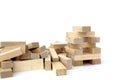 A bunch of jenga game details lie on a white background. Royalty Free Stock Photo