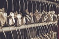 Bunch of key hanging on the wire in key maker shop Royalty Free Stock Photo