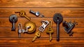 Bunch of keys laying on top of wooden floor next to each other. Generative AI Royalty Free Stock Photo