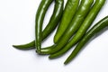 A bunch of large green hot peppers as a frame on white, top view, place for text Royalty Free Stock Photo