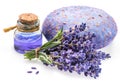 Bunch of lavandula, lavender essential oil and soap on white background