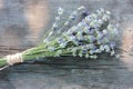 Bunch of lavender flowers on gray weathered wooden background. Royalty Free Stock Photo