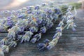 Bunch of lavender flowers on gray weathered wooden background. Royalty Free Stock Photo