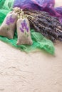 Bunch of lavender flowers and sachets filled with dried lavender. Royalty Free Stock Photo