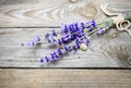 Bunch of lavender flowers with snail on an old wood table Royalty Free Stock Photo