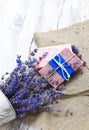 Bunch of lavender flowers,soap on old wooden background.Spa tre Royalty Free Stock Photo