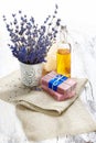 Bunch of lavender flowers,soap on old wooden background.Spa tre Royalty Free Stock Photo