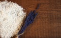 A bunch of lavender lying next to sea salt Royalty Free Stock Photo