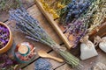 Bunch of lavender and medicinal herbs, mortar of dry flowers.