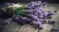 a bunch of lavenders on a wooden table with twine Royalty Free Stock Photo