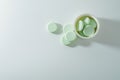 A bunch of medicinal pills and antibiotics, White medical tablets, light green, with copy space