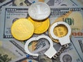 a bunch of metal handcuffs, and a coin and a bitcoin
