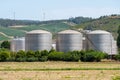 Bunch of metal industrial silos for product storage Royalty Free Stock Photo