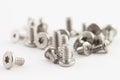 Bunch metal industry grey chrome bolts isolated white background