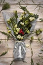 Bunch of mistletoe on a wooden surface