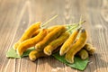 Bunch of Mucuna pruriens on wooden table