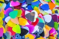 Bunch of multi-colored bright picks for playing guitar collection of accessories Royalty Free Stock Photo