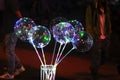 Bunch of multi colored LED ballons at night Royalty Free Stock Photo