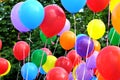 Multicolored balloons in the city festival Royalty Free Stock Photo