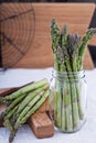Bunch og fresh green asparagus in a jar Royalty Free Stock Photo