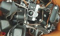 Bunch of old film cameras  put in a cardboard box Royalty Free Stock Photo