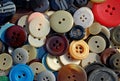 Bunch of old flat sew-trough buttons photography Royalty Free Stock Photo