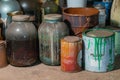 Bunch of old rusty paint cans and jars - In the workshop