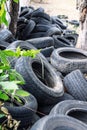 A bunch of old tires from used cars