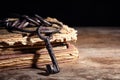 Bunch of old vintage keys with books on wooden table Royalty Free Stock Photo