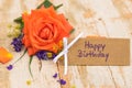 Happy Birthday card with beautiful bunch of rose flower on wooden background Royalty Free Stock Photo