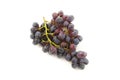 Bunch of organic black grapes isolated on white background Royalty Free Stock Photo