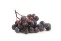 Bunch of organic black grapes isolated on white background Royalty Free Stock Photo