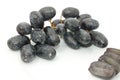 Bunch of organic black grapes isolated on white background Royalty Free Stock Photo