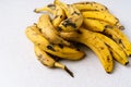 Bunch of overripe bananas as ingredients for banana bread, closeup view