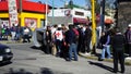 Car crash in a street, crowd watching