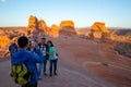 Bunch of people waiting for the bucket photo at the Delicate Arch, Utah, United States of America, crazy tourism, reality, Royalty Free Stock Photo